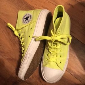 Yellow high top converse